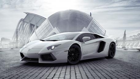 Sleek Lamborghini Aventador in a Modern Cityscape wallpaper