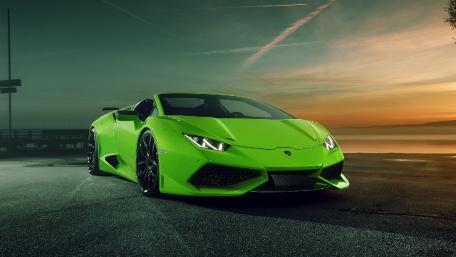 Vibrant Green Lamborghini in Sunset Glow wallpaper
