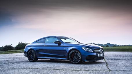 Sleek Blue Luxury Sports Car Wallpaper wallpaper