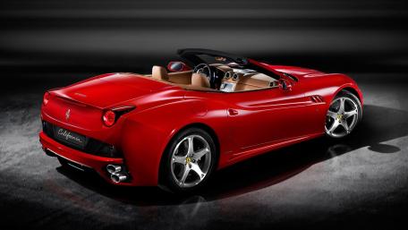 Sleek Red Ferrari Convertible Wallpaper wallpaper