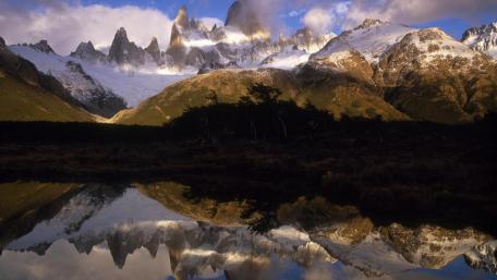Majestic Mountains and Serene Reflections wallpaper