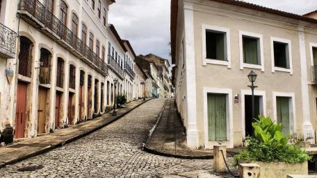 Charming Cobblestone Street in a Historic City Scene wallpaper