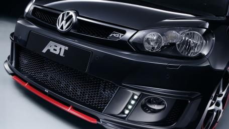 Sleek Black Volkswagen with Custom ABT Features wallpaper