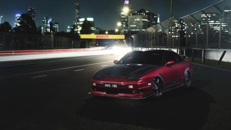 Sleek Nighttime Sports Car Wallpaper wallpaper