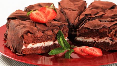 Decadent Chocolate Cake Delightful Layers and Fresh Strawberries wallpaper