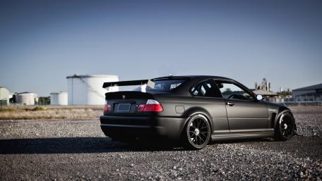 Sleek Black Sports Car at Dusk wallpaper