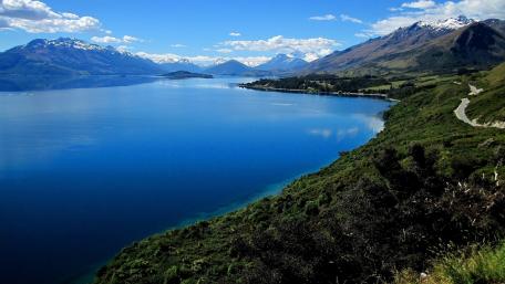 Serene Mountain Lake View with Lush Mountainside wallpaper