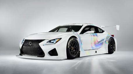Sleek White Sports Car with Vibrant Accents wallpaper