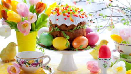 Festive Easter Celebration with Colorful Treats and Flowers wallpaper