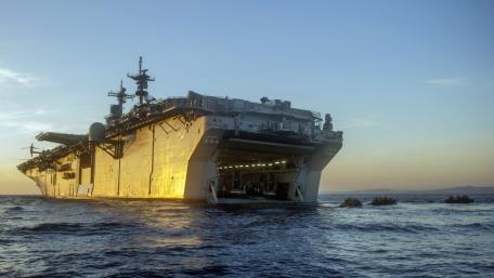 Majestic Military Vessel at Sunset wallpaper