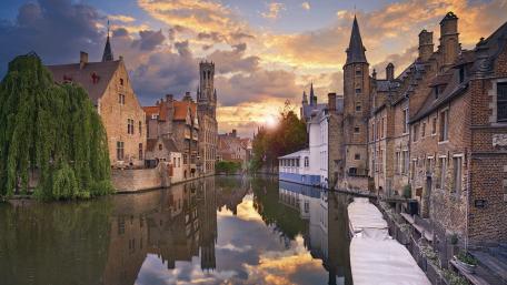 Charming Sunset Over Historic City Canals wallpaper