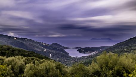 Serene Coastal Landscape in Purple Hues wallpaper