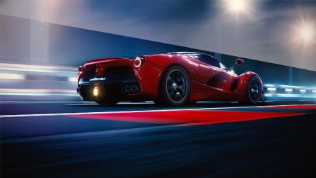 Sleek Red Supercar in Motion wallpaper