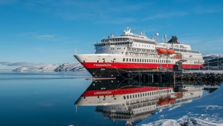 Majestic Ship Docked in Serene Waters wallpaper