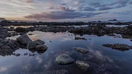 Serene Coastal Landscape at Sunset wallpaper