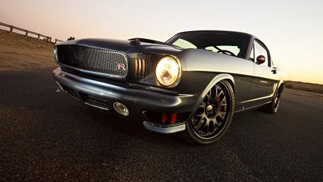 Classic Muscle Car in Motion wallpaper