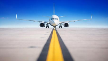 Airplane Ready for Takeoff on Runway wallpaper