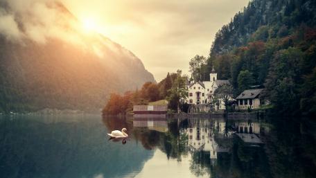 Tranquil Lake Reflection Amidst Mountain Serenity wallpaper