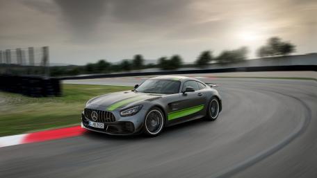 Sleek Mercedes on the Track in Motion wallpaper