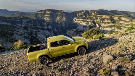 Adventurous Yellow Truck in Scenic Landscape wallpaper