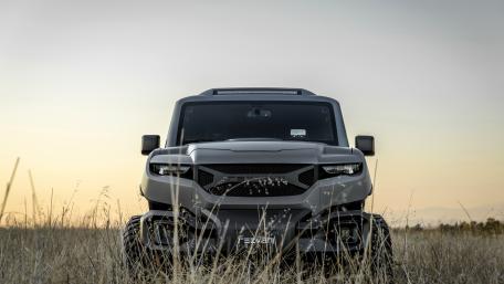 Bold SUV in Natural Landscape Wallpaper wallpaper