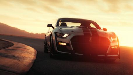 Sleek Supercar at Sunset Grind wallpaper