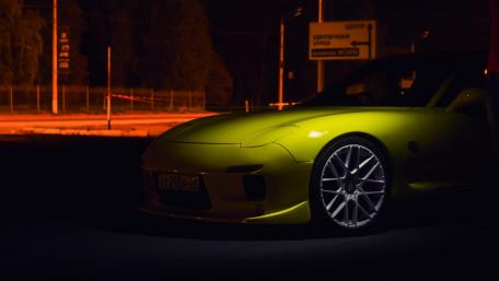 Vibrant Night Ride of a Sports Car wallpaper