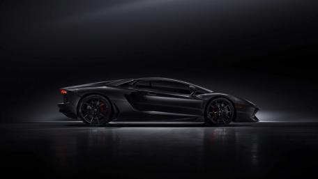 Sleek Black Luxury Car Wallpaper wallpaper