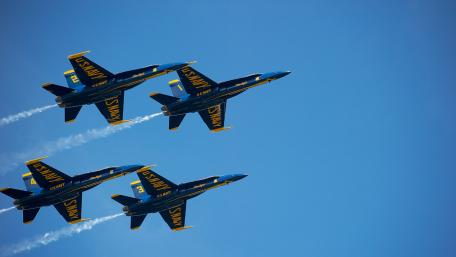 Aerial Display of Precision Fighter Jets During a Training Flight wallpaper