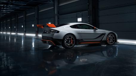 Sleek Silver Supercar in an Industrial Space wallpaper