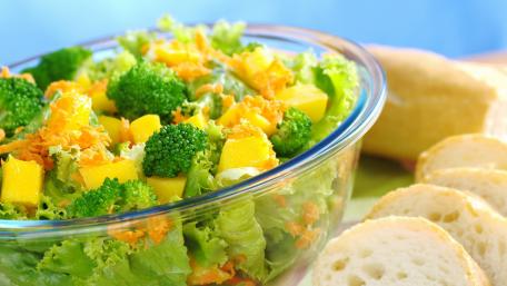 Fresh and Colorful Salad Bowl with Bread wallpaper