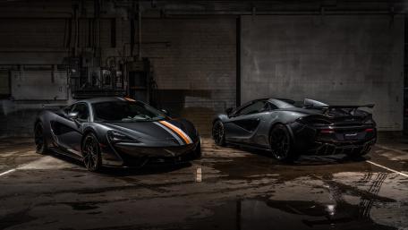 Sleek McLaren Supercars in Stunning Setting wallpaper