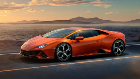 Bold and Striking Lamborghini on Scenic Roadway wallpaper
