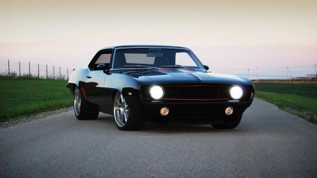Classic Black Camaro on Open Road wallpaper
