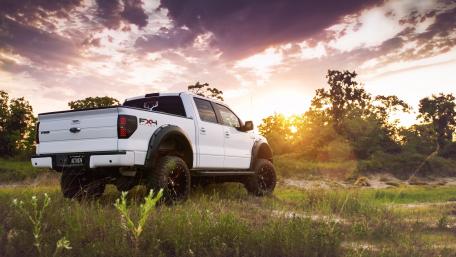 Rugged Truck Against a Stunning Sunset wallpaper