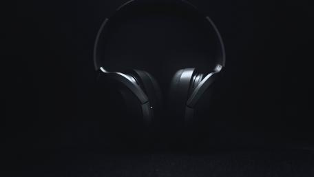 Sleek Headphones in Dark Ambience wallpaper