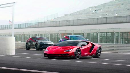 Sleek Competition on the Race Track wallpaper