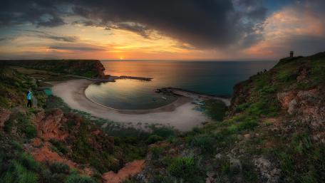 Serene Coastal Sunset Over a Hidden Cove wallpaper