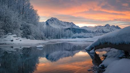 Serene Winter Landscape with Reflections in Nature's Beauty wallpaper