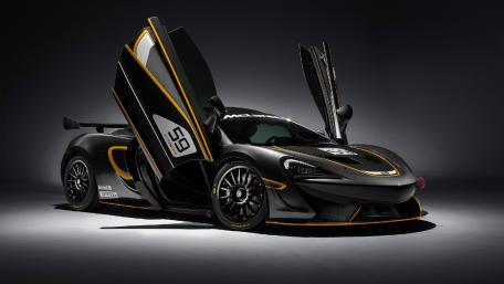 Sleek Black McLaren with Wings Up Design wallpaper