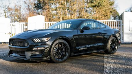 Sleek Black Sports Car Wallpaper wallpaper