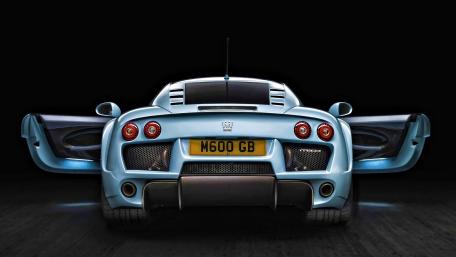 Sleek and Powerful Blue Supercar Wallpaper wallpaper
