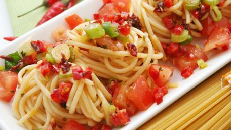 Delicious Spaghetti with Fresh Vegetables and Spices wallpaper