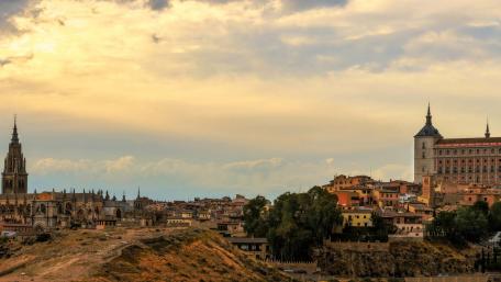 Historic Cityscape Under a Golden Sky wallpaper