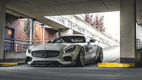 Sleek Mercedes in Urban Setting for Car Enthusiasts wallpaper