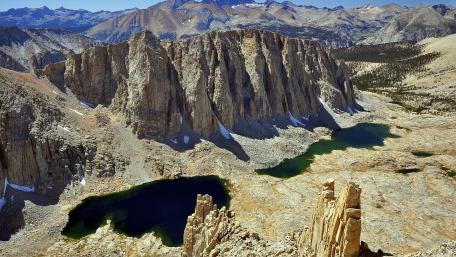 Majestic Mountain Landscape Beneath Clear Blue Skies wallpaper