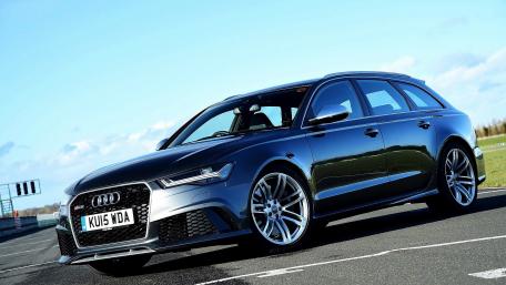 Sleek Audi RS6 Avant in Dynamic Setting wallpaper