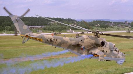 Helicopter in Action at Military Airfield wallpaper