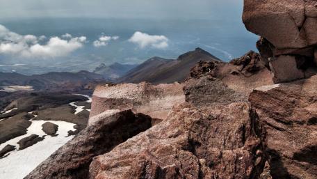 Majestic Mountain Landscape with Clouds and Snow wallpaper