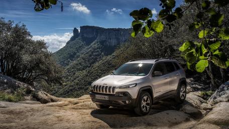 Adventurous SUV in Scenic Landscape wallpaper